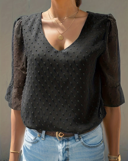 Losse blouse met lage mouwen