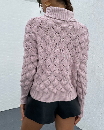 Roze gebreide trui met polokraag
