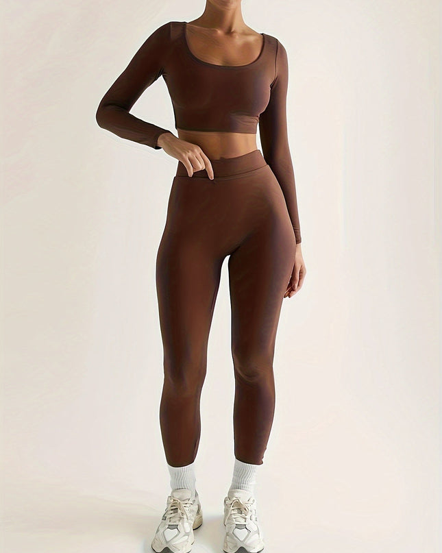 Sportieve crop top met lage mouwen en strakke broek
