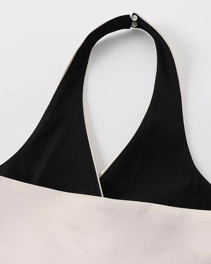 Champagnekleurige top met strikceintuur