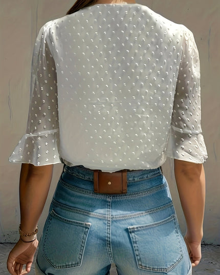 Losse blouse met lage mouwen