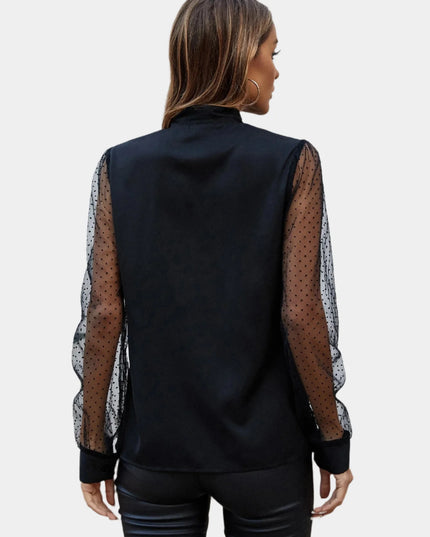 Mouwloos shirt met mesh en knopen
