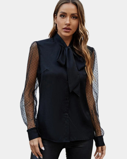 Mouwloos shirt met mesh en knopen