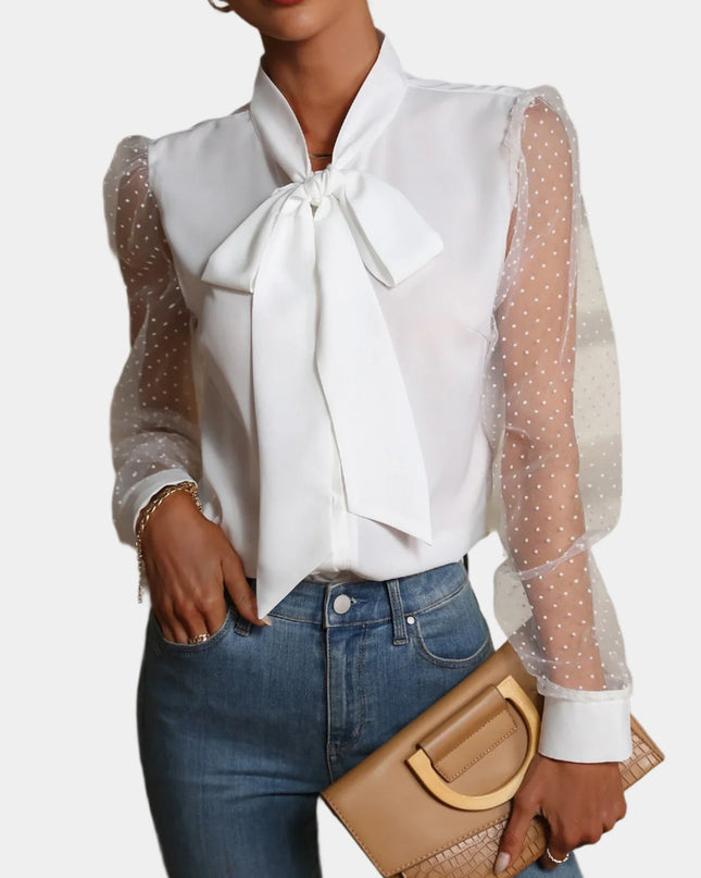 Mouwloos shirt met mesh en knopen