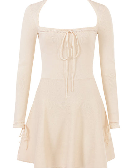 Crèmekleurige elegante mini-jurk met open voorkant