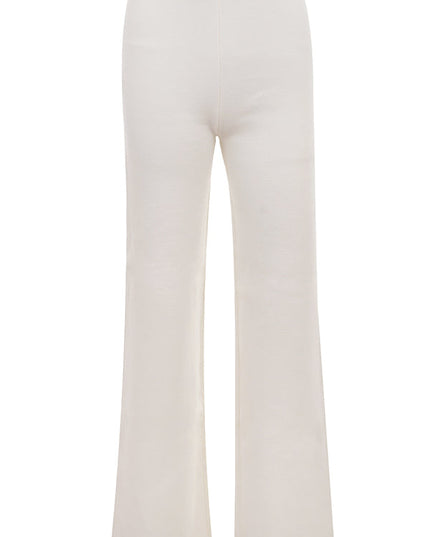 Wit gebreid vest met V-hals en broek