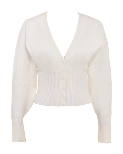 Wit gebreid vest met V-hals en broek
