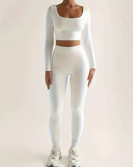 Sportieve crop top met lage mouwen en strakke broek