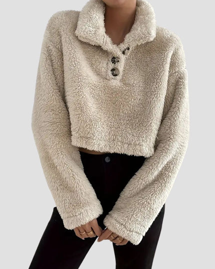 Crèmekleurige sweater met polokraag
