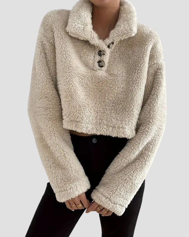 Crèmekleurige sweater met polokraag