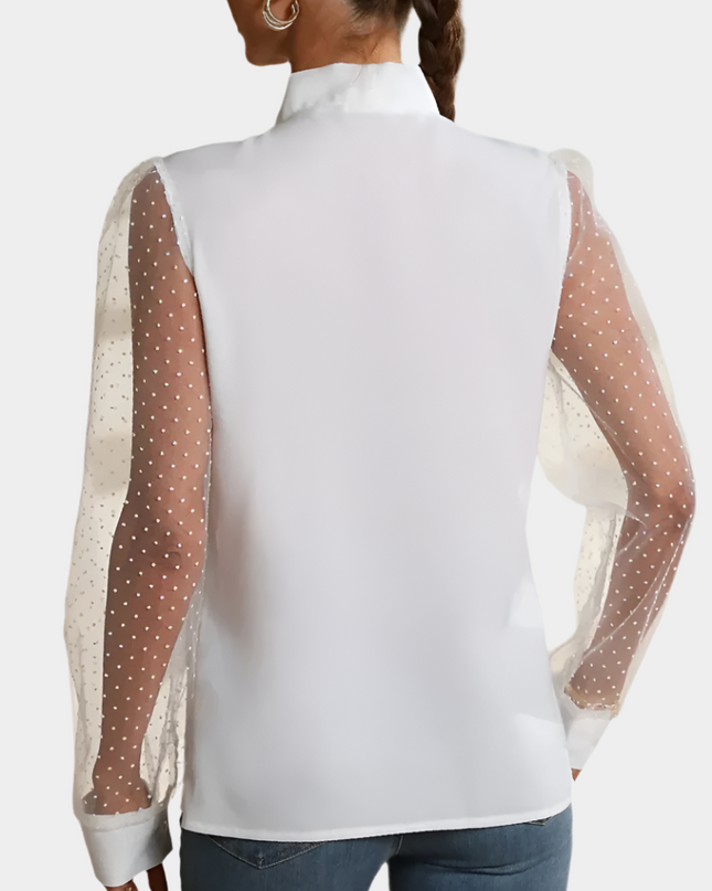 Mouwloos shirt met mesh en knopen