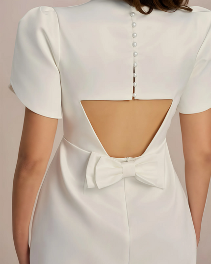 Witte Lorena mini-jurk met uitsparing op de rug en strikdetail