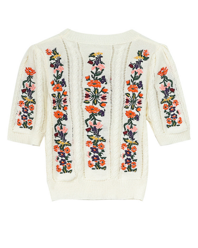 Gebreide top met geborduurde bloemen