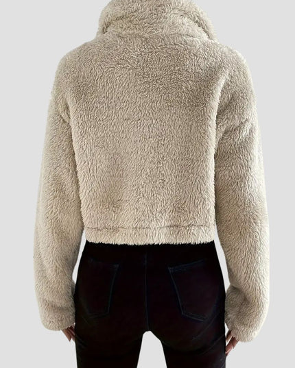 Crèmekleurige sweater met polokraag