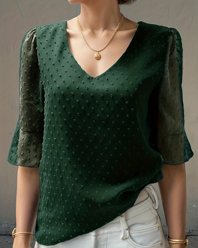 Losse blouse met lage mouwen