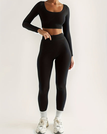 Sportieve crop top met lage mouwen en strakke broek