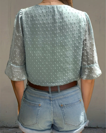 Losse blouse met lage mouwen