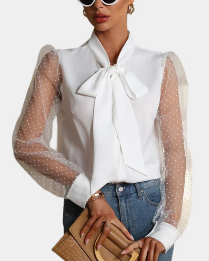 Mouwloos shirt met mesh en knopen