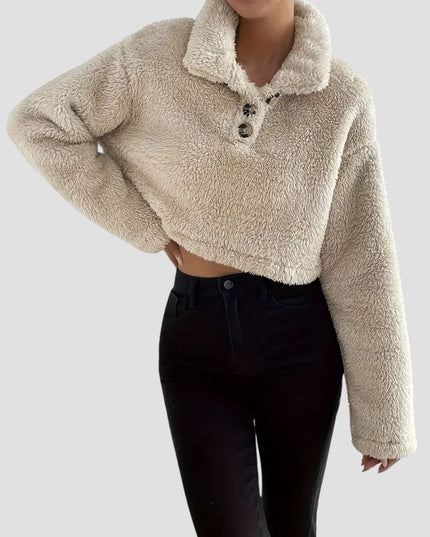 Crèmekleurige sweater met polokraag