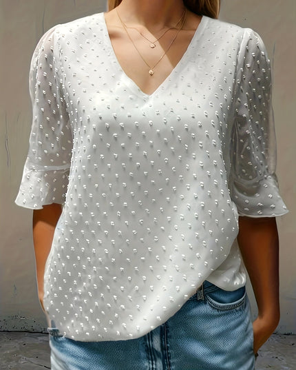 Losse blouse met lage mouwen
