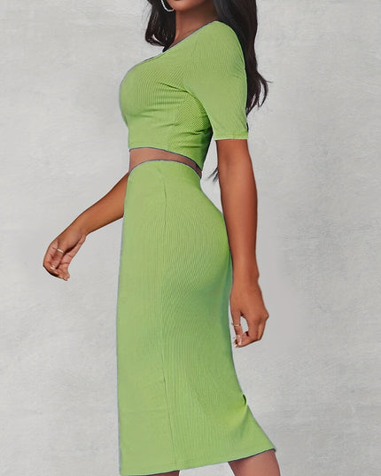 Croptop met uitsparing en rok met split