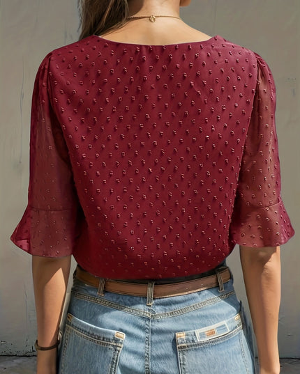 Losse blouse met lage mouwen