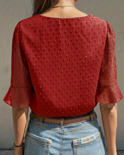 Losse blouse met lage mouwen