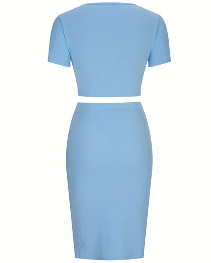 Croptop met uitsparing en rok met split