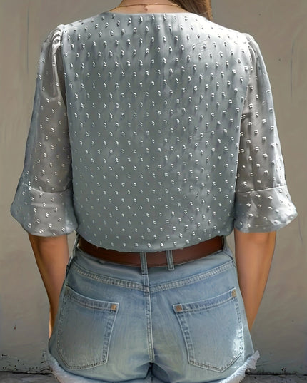Losse blouse met lage mouwen