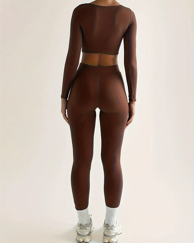 Sportieve crop top met lage mouwen en strakke broek