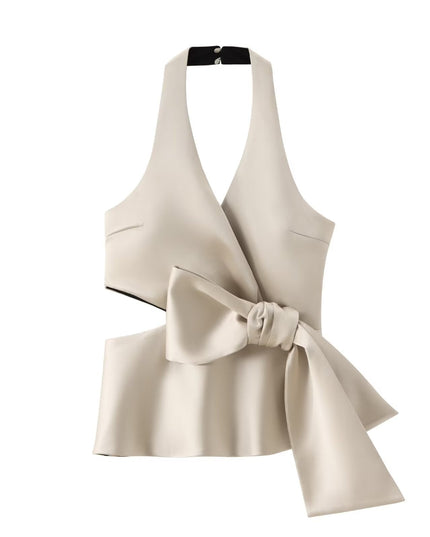 Champagnekleurige top met strikceintuur