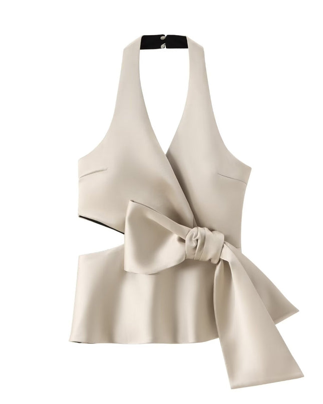 Champagnekleurige top met strikceintuur