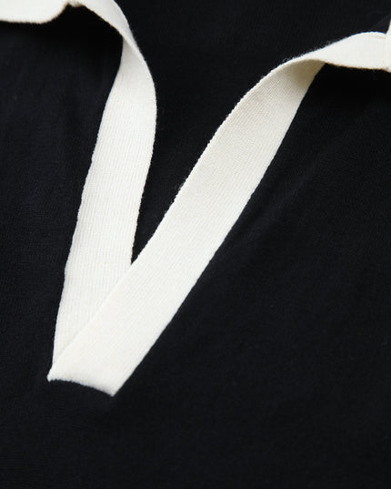 V-hals vest met contrastkraag