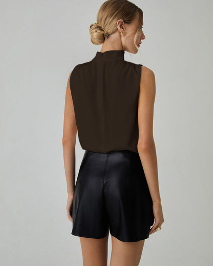 Mouwloze blouse met hoge halslijn