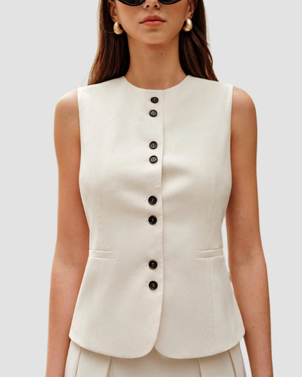 Elegante set met knoopvest en minirok
