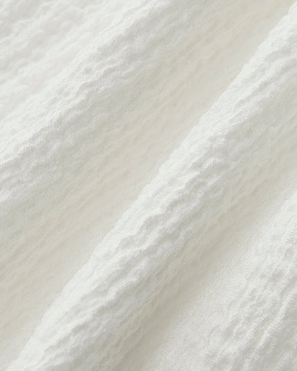 Top met strikdetail in V-hals