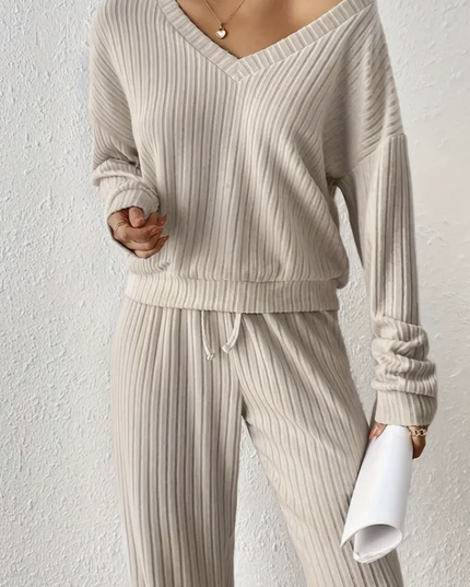 Gestreepte lange broek met V-hals trui