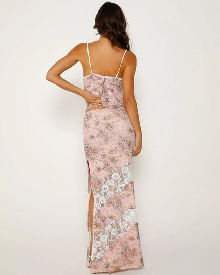 Mouwloze roze top met bloemenprint en maxi-rok