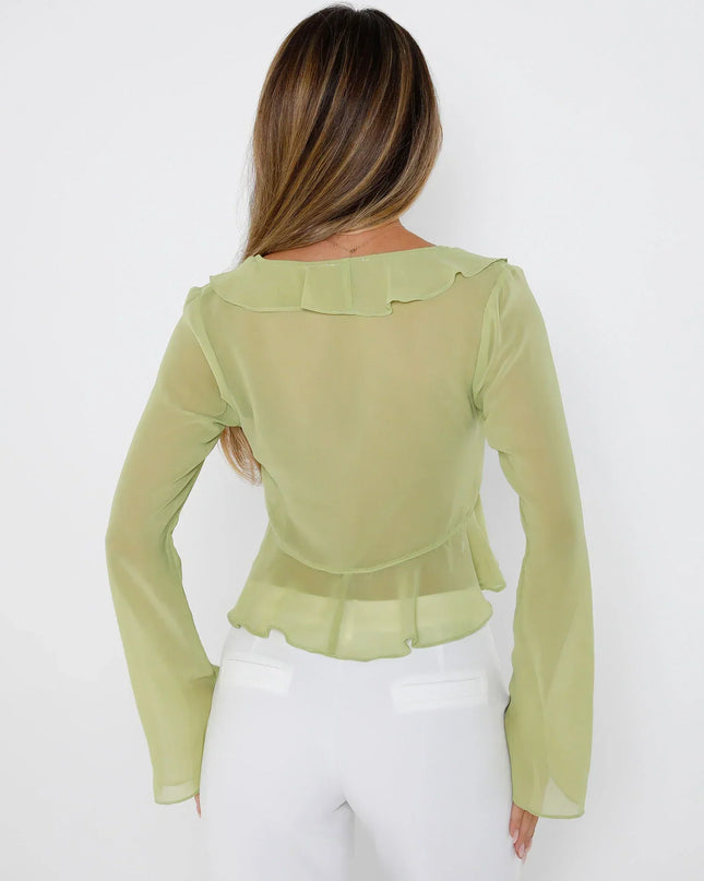 Groene top met kant aan de voorkant