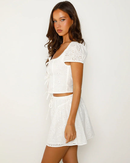 Witte top met korte mouwen en minirok
