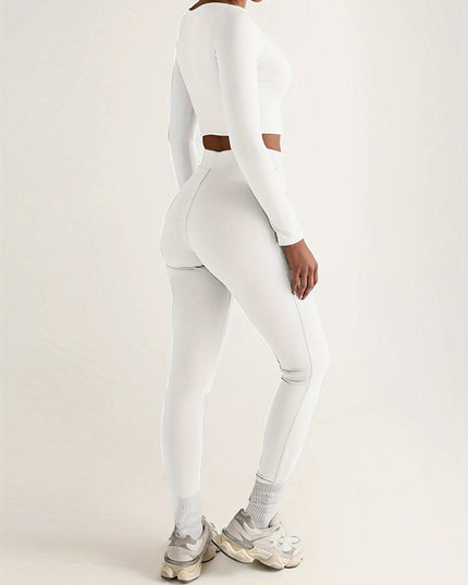 Sportieve crop top met lage mouwen en strakke broek