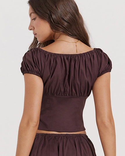 Diepbruine geplooide top en geplooide midi-rok