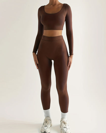 Sportieve crop top met lage mouwen en strakke broek