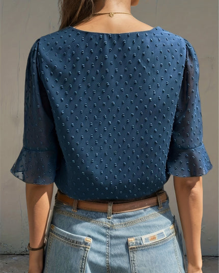 Losse blouse met lage mouwen