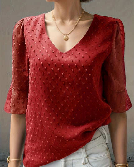 Losse blouse met lage mouwen