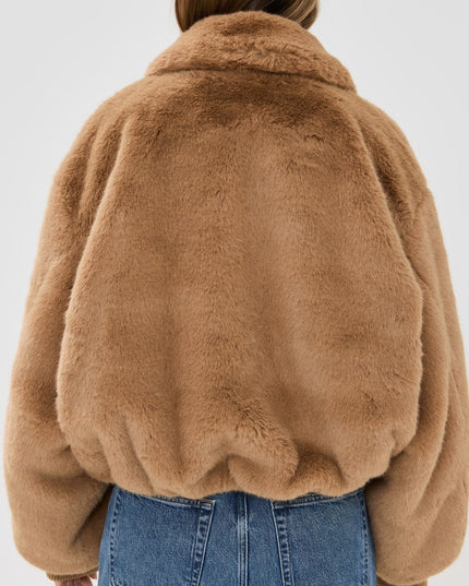 Fluffy jasje met polokraag en rits