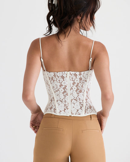 Kanten korset en karamelkleurige broek