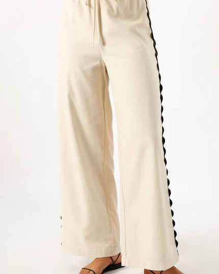 Top met ruches en wijde broek