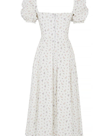 Middelgrote zomerjurk met bloemen pofmouwen