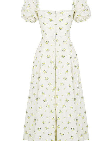 Middelgrote zomerjurk met bloemen pofmouwen